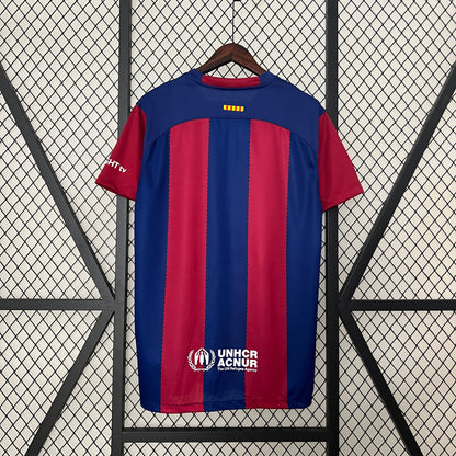 CAMISETA FC BARCELONA LOCAL KAROL G 23/24 - La Casa del Fútbol